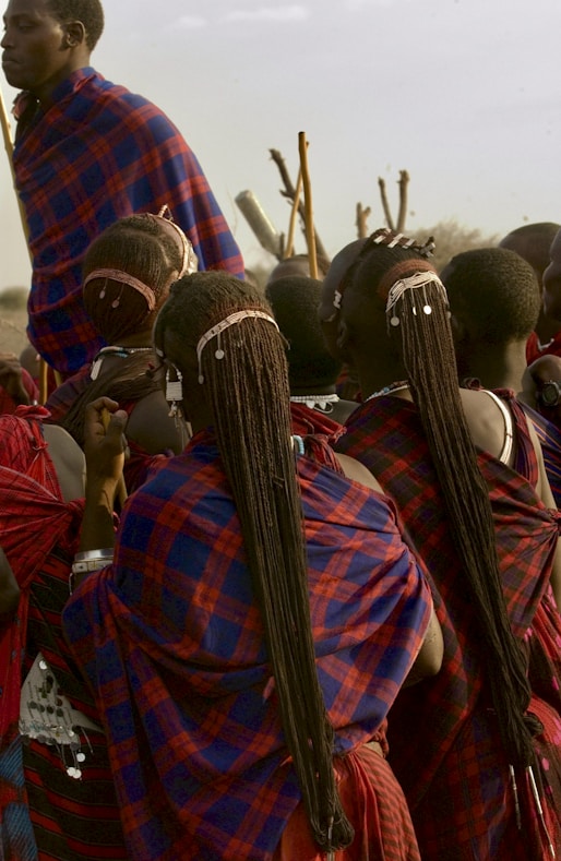 people wearing red and black plaid shirt