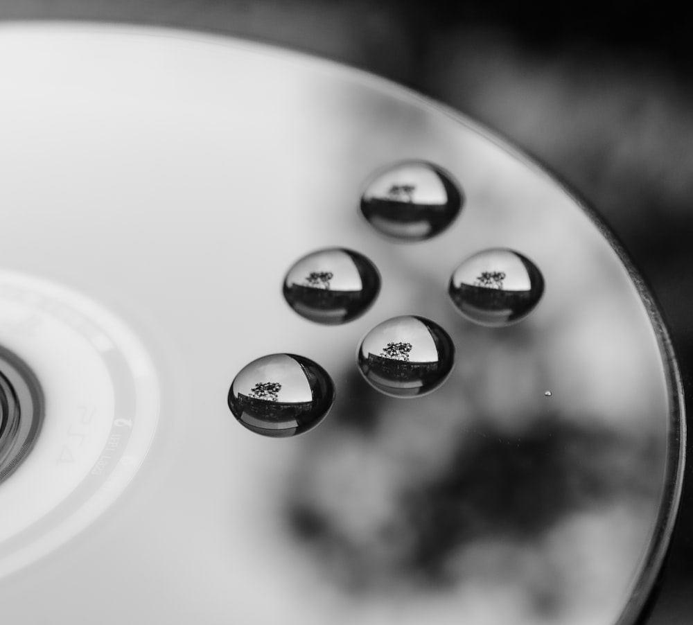 grayscale photo of round disc