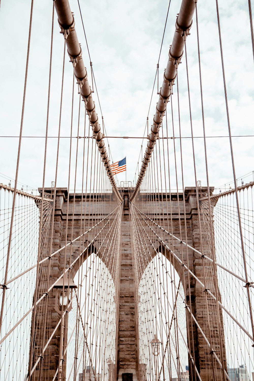 gray bridge under white sky during daytime