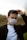 man in black jacket wearing white face mask