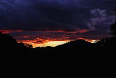 Dramatic landscape shot of sunset over hills
