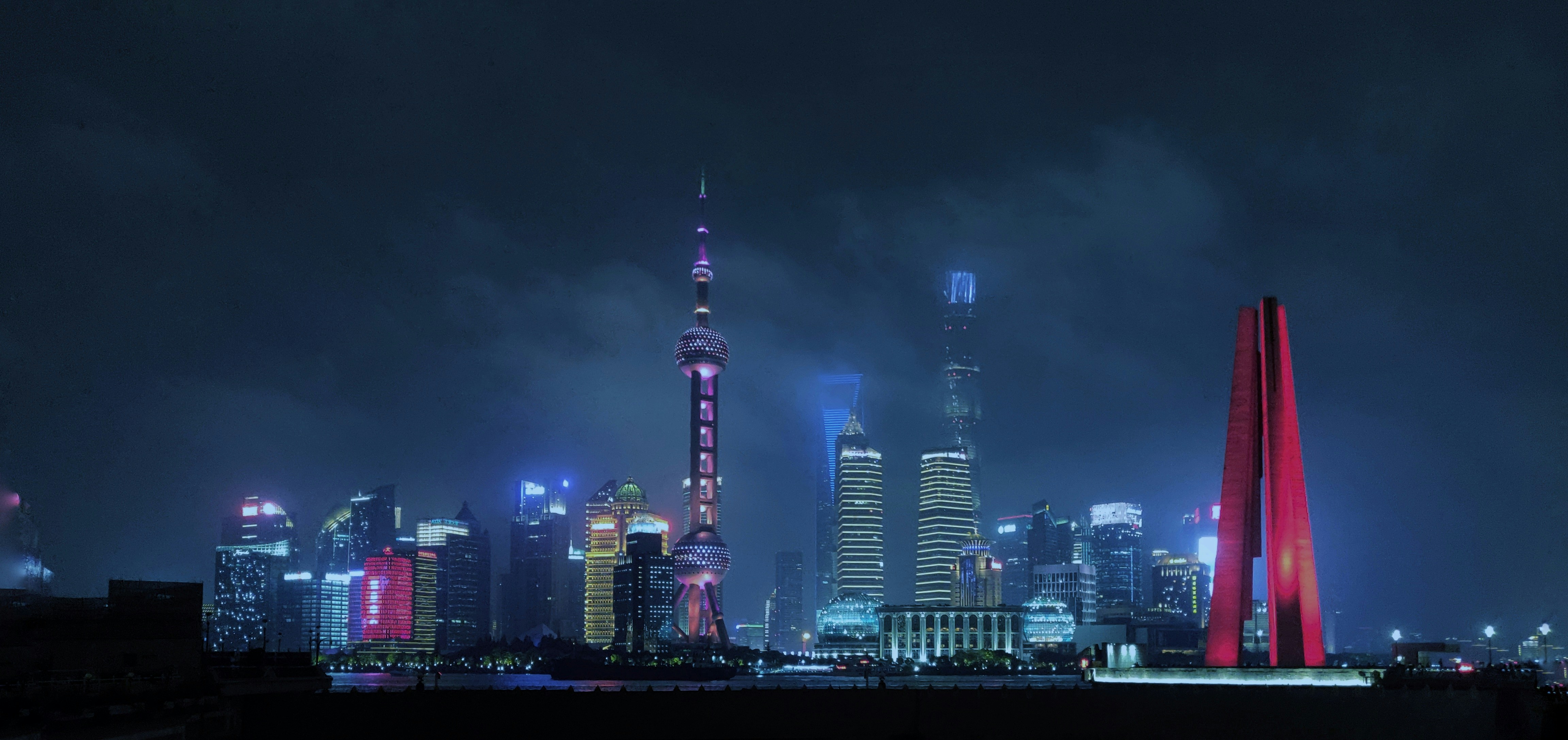 city skyline during night time