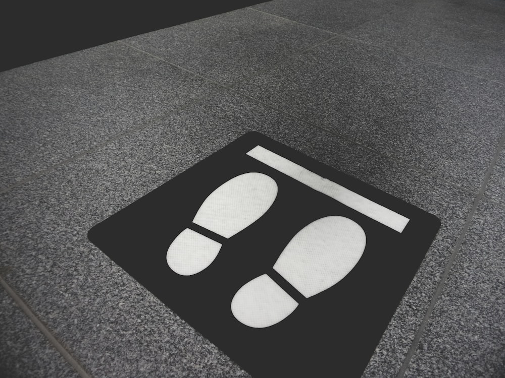 black and white square print floor rug