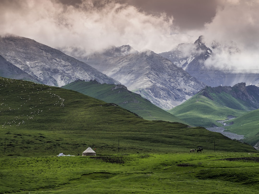 green mountains under white sky during daytime