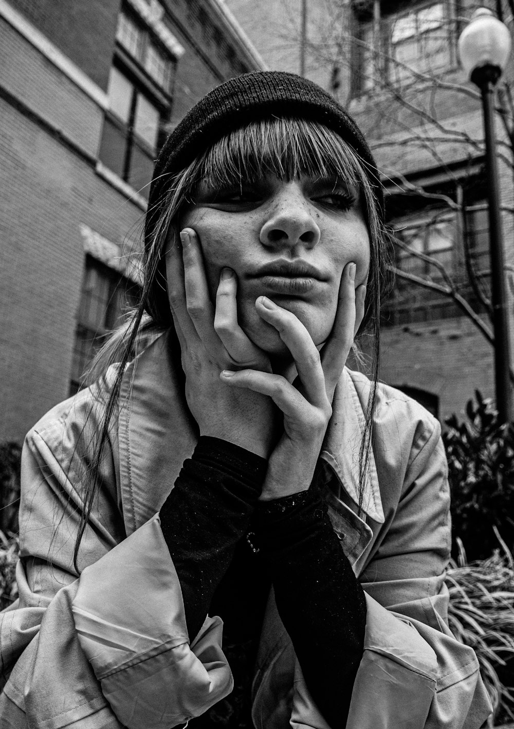 grayscale photo of woman in jacket