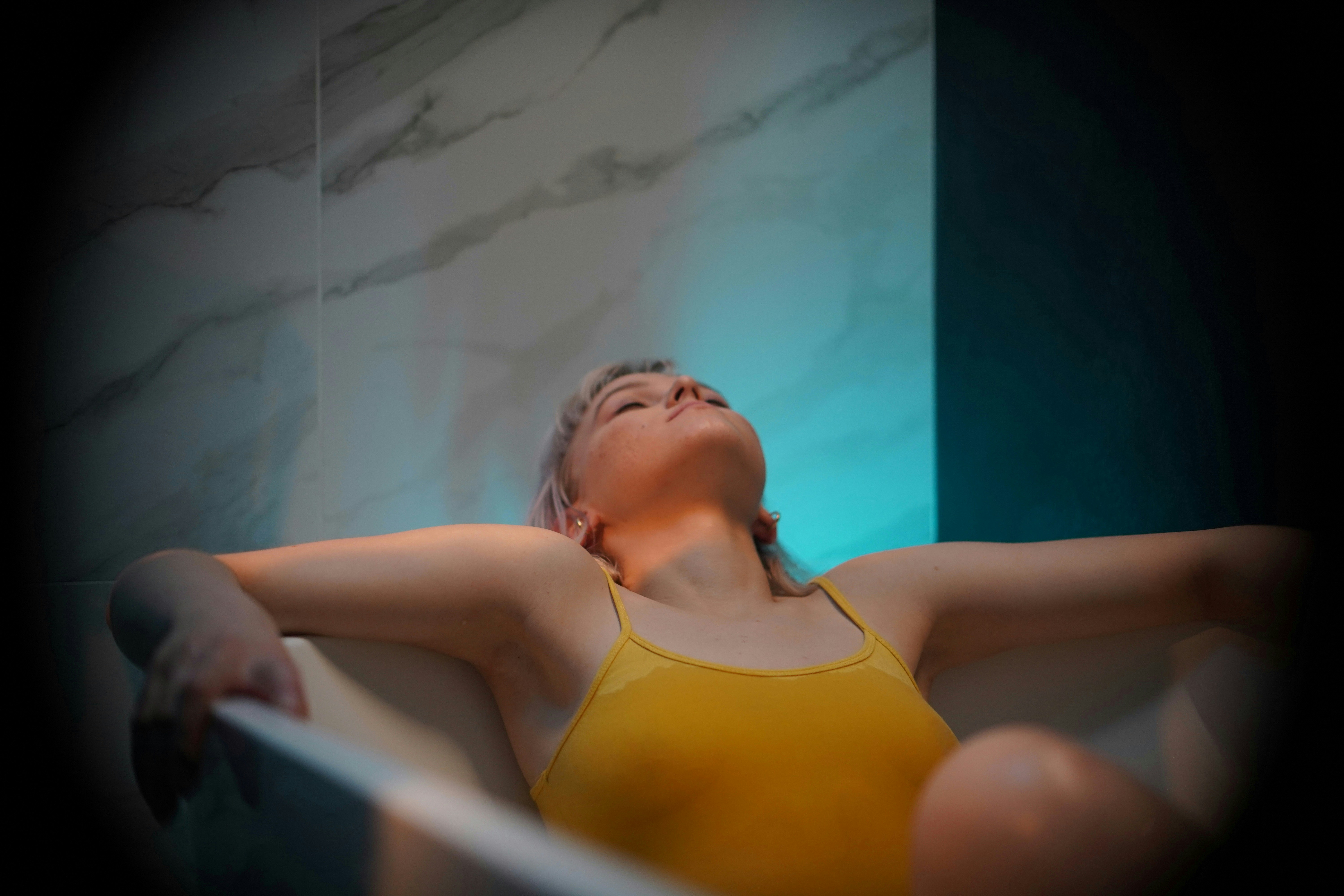 woman in yellow bikini top