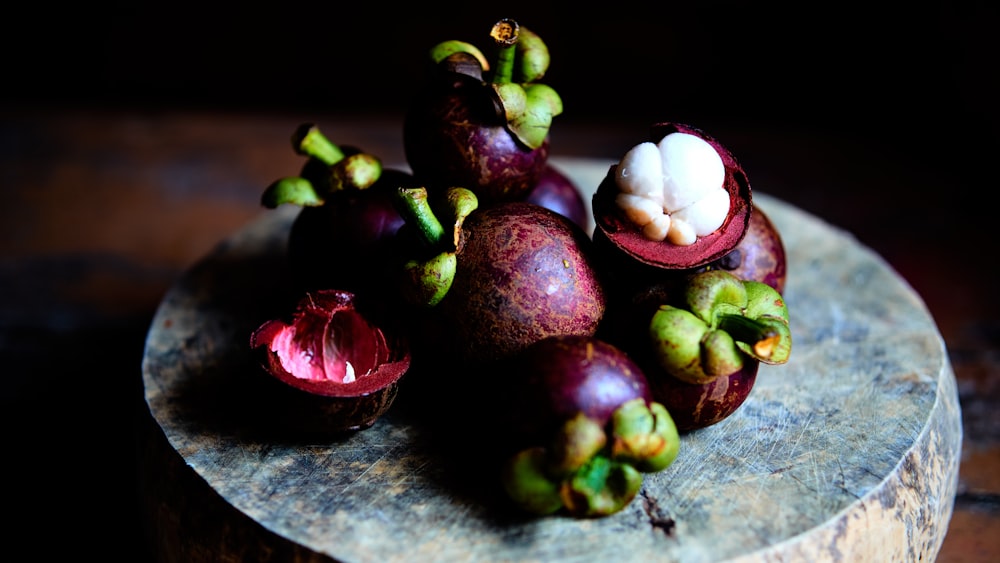 red and green round fruits