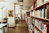 books on shelves in library