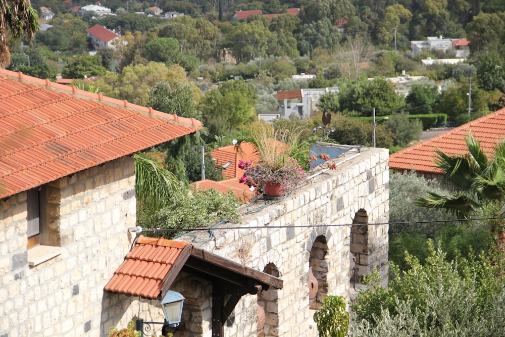 a brick building with a red tiled roof