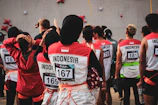 people in red and white jersey shirt