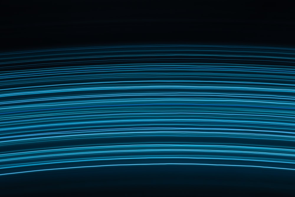 a black background with blue lines in the middle