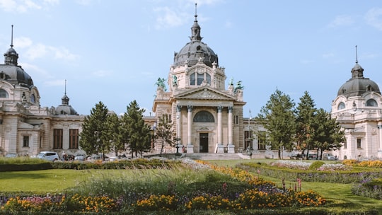 white and brown concrete building in City Park Hungary