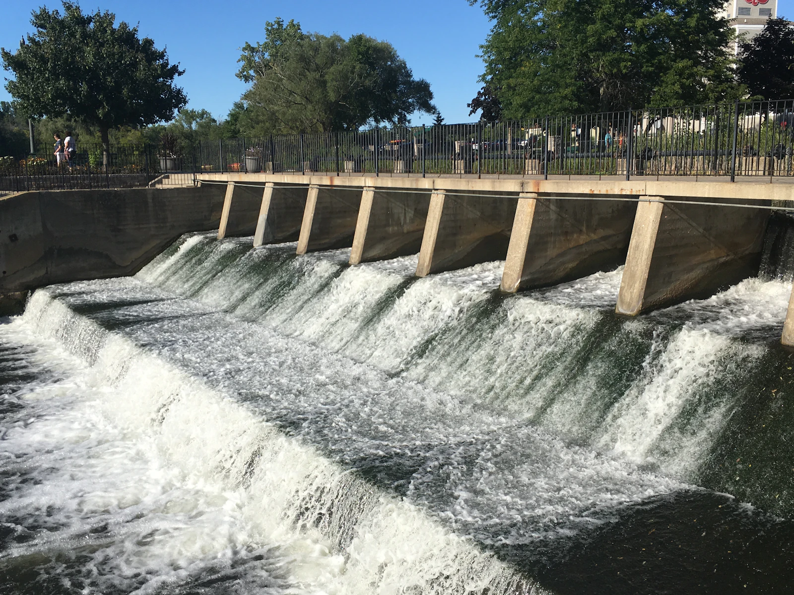 Water flowing over the Rockford dam on the Rogue River in downtown Rockford, Michigan