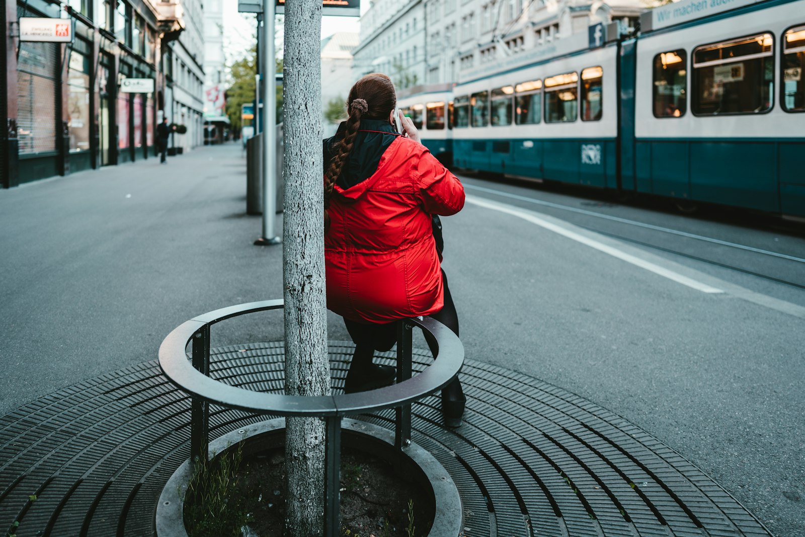 Sony FE 24mm F1.4 GM sample photo. Woman in red jacket photography