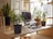 A serene workspace with natural wooden elements and green plants around.
