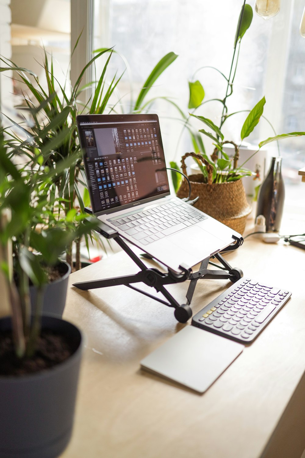 black and white laptop computer on white table