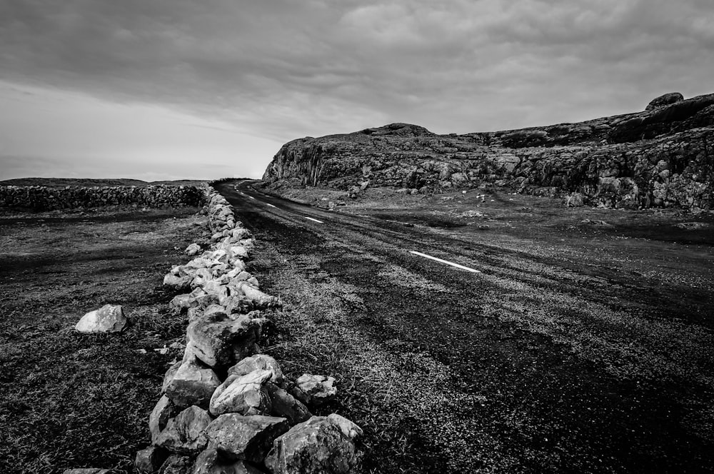 grayscale photo of rocky road