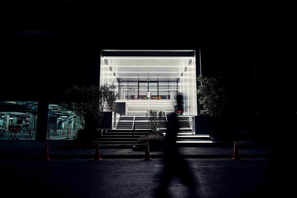 white wooden bench near glass window