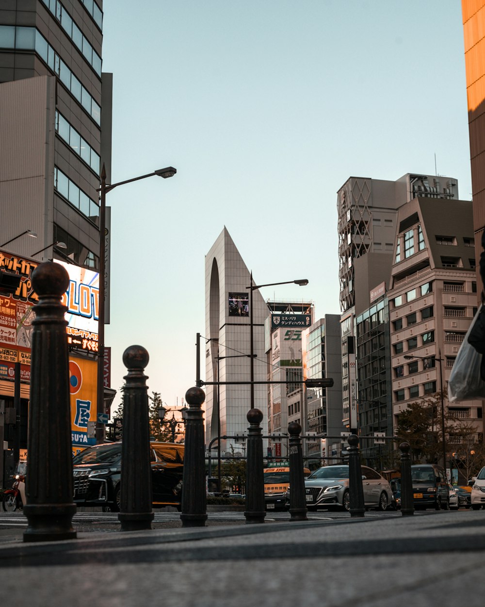 people walking on sidewalk near buildings during daytime