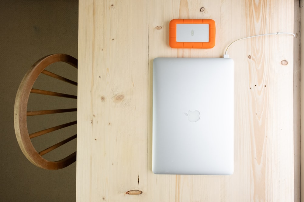 white ipad on white table