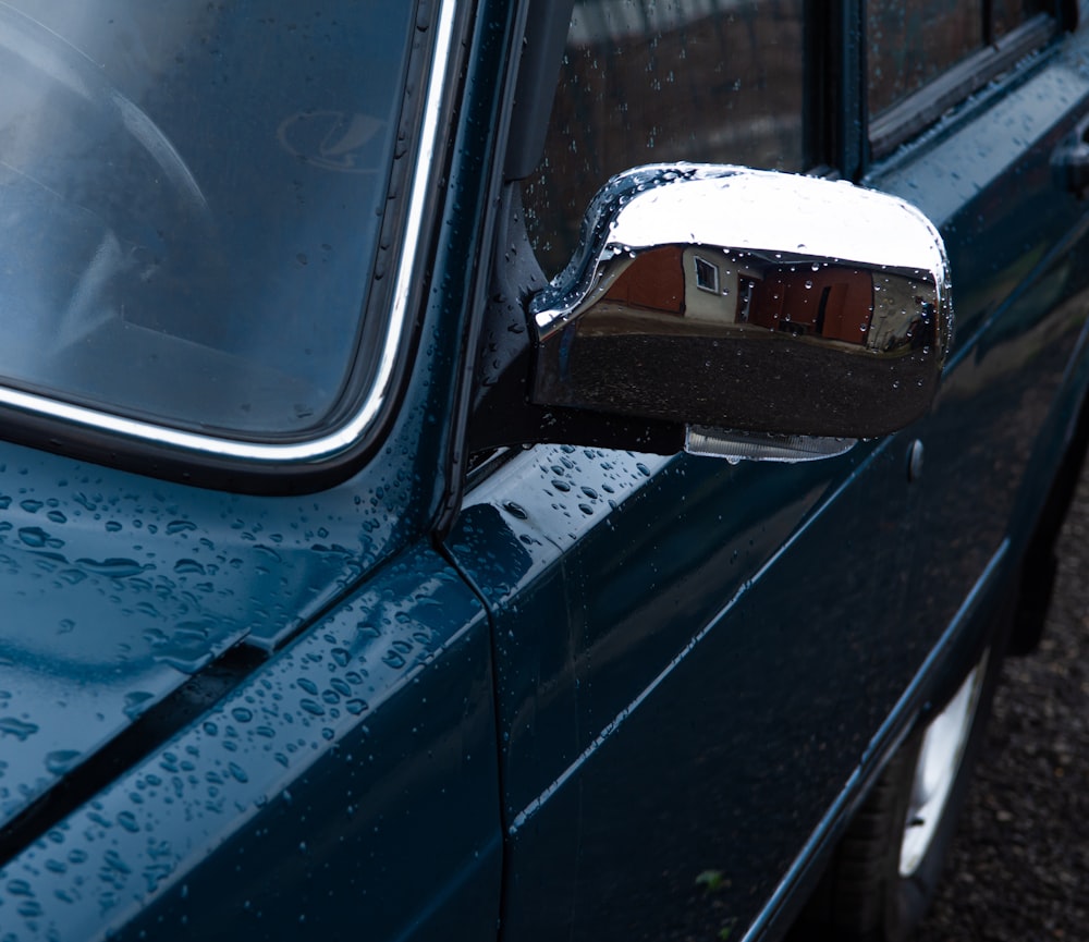 black car side mirror during daytime