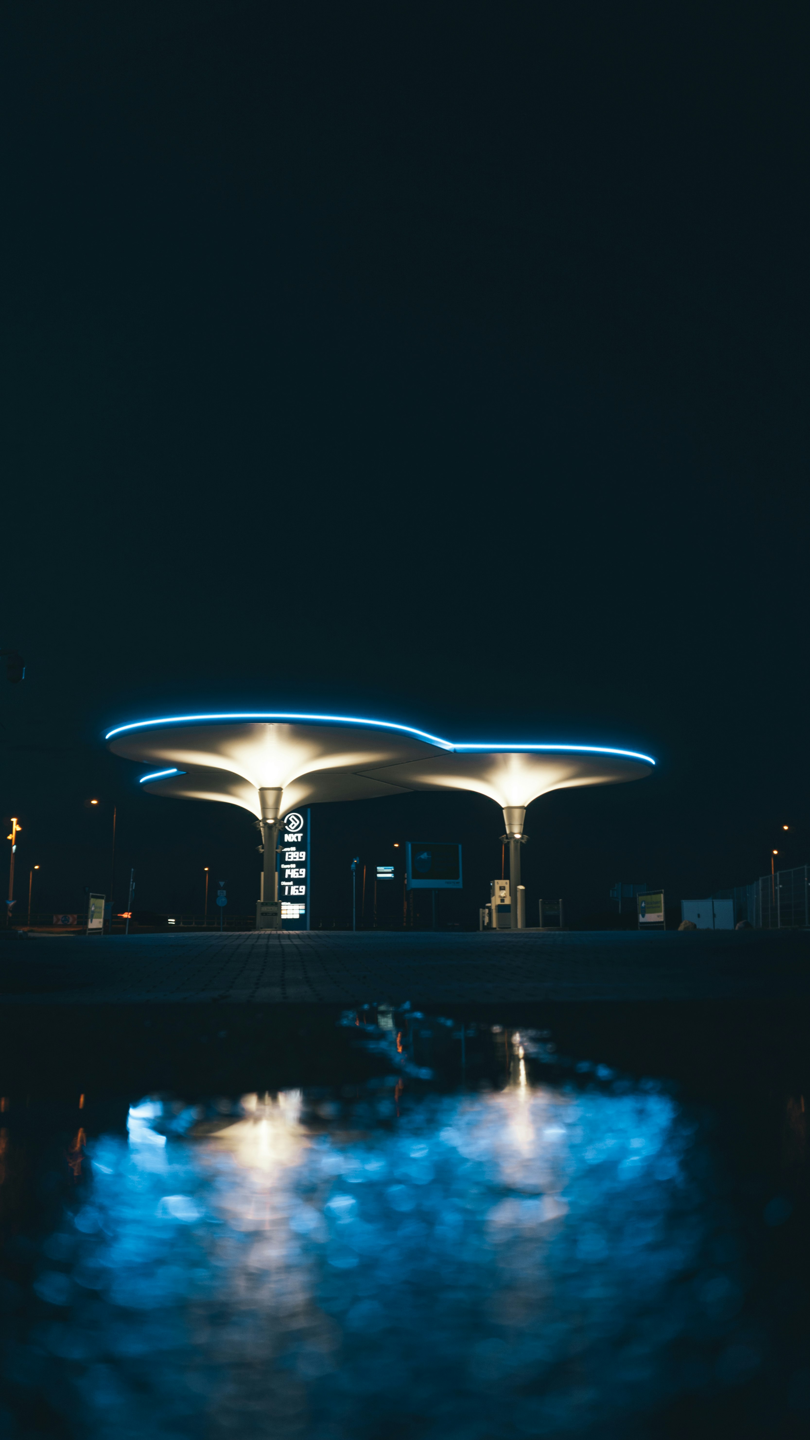 white and black building with lights during night time