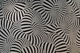 black and white striped textile resembling skeins of yarn with no beginning or end