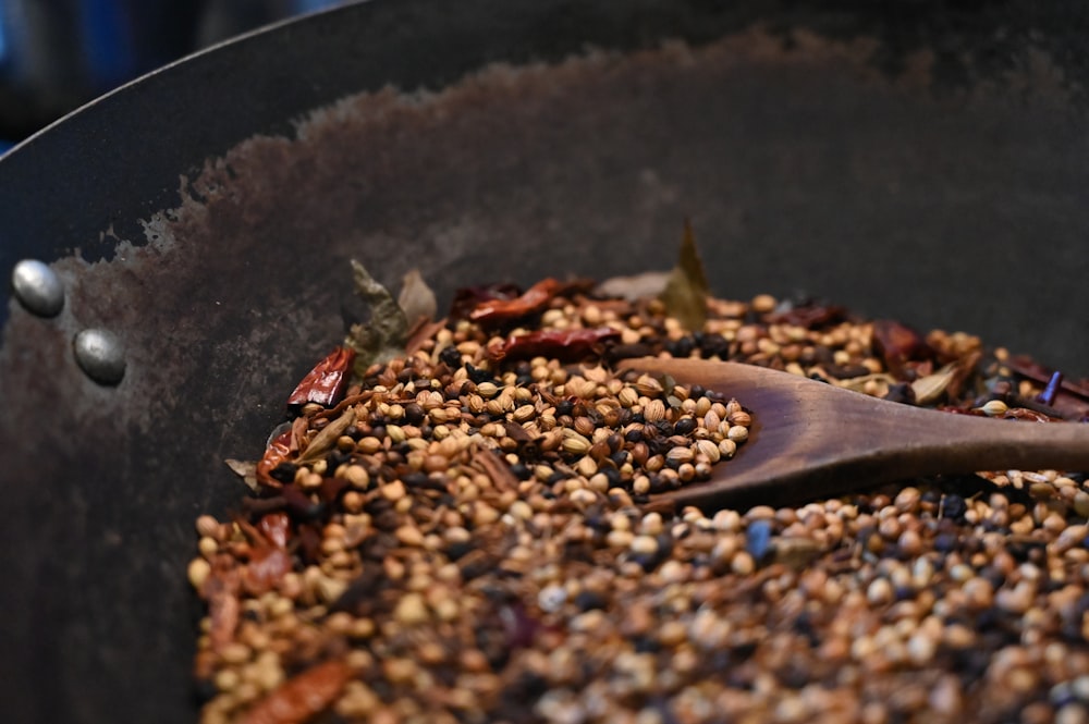 brown and black beans on black pan