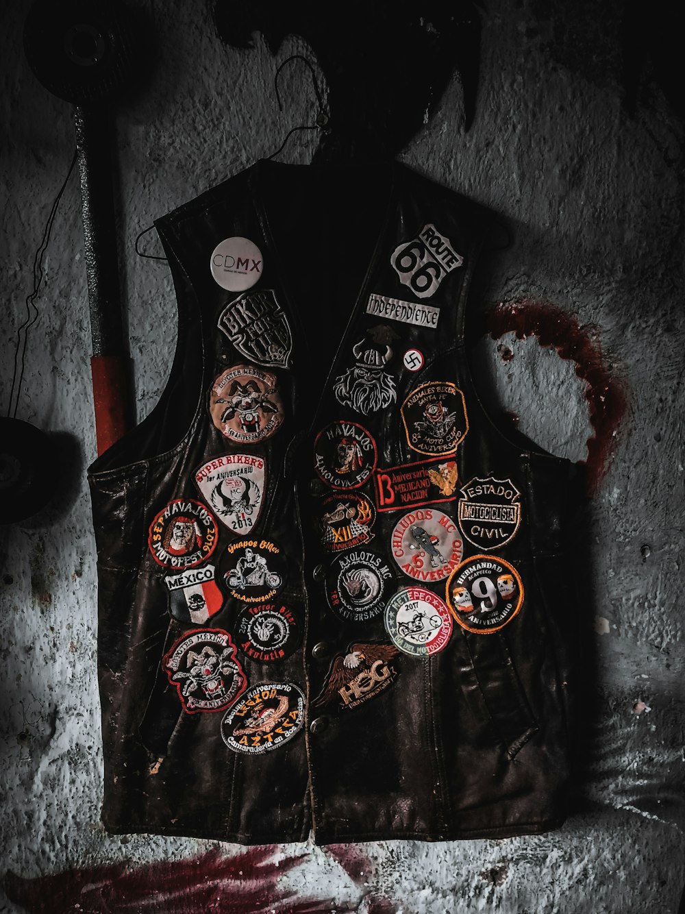 a leather vest with patches and patches on it
