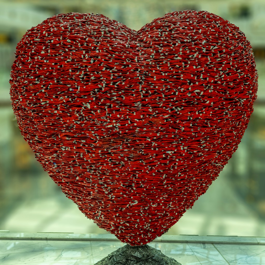 red heart shaped ornament on glass table