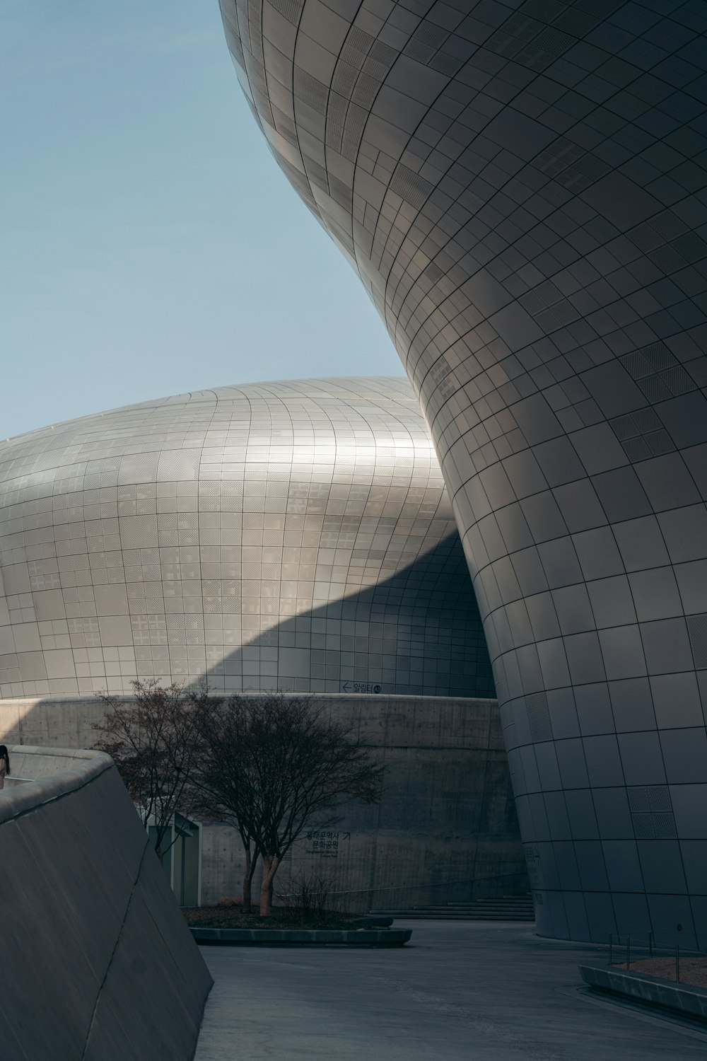 gray concrete building under blue sky during daytime