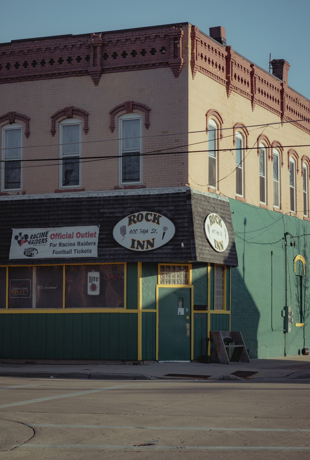 green and brown concrete building during daytime