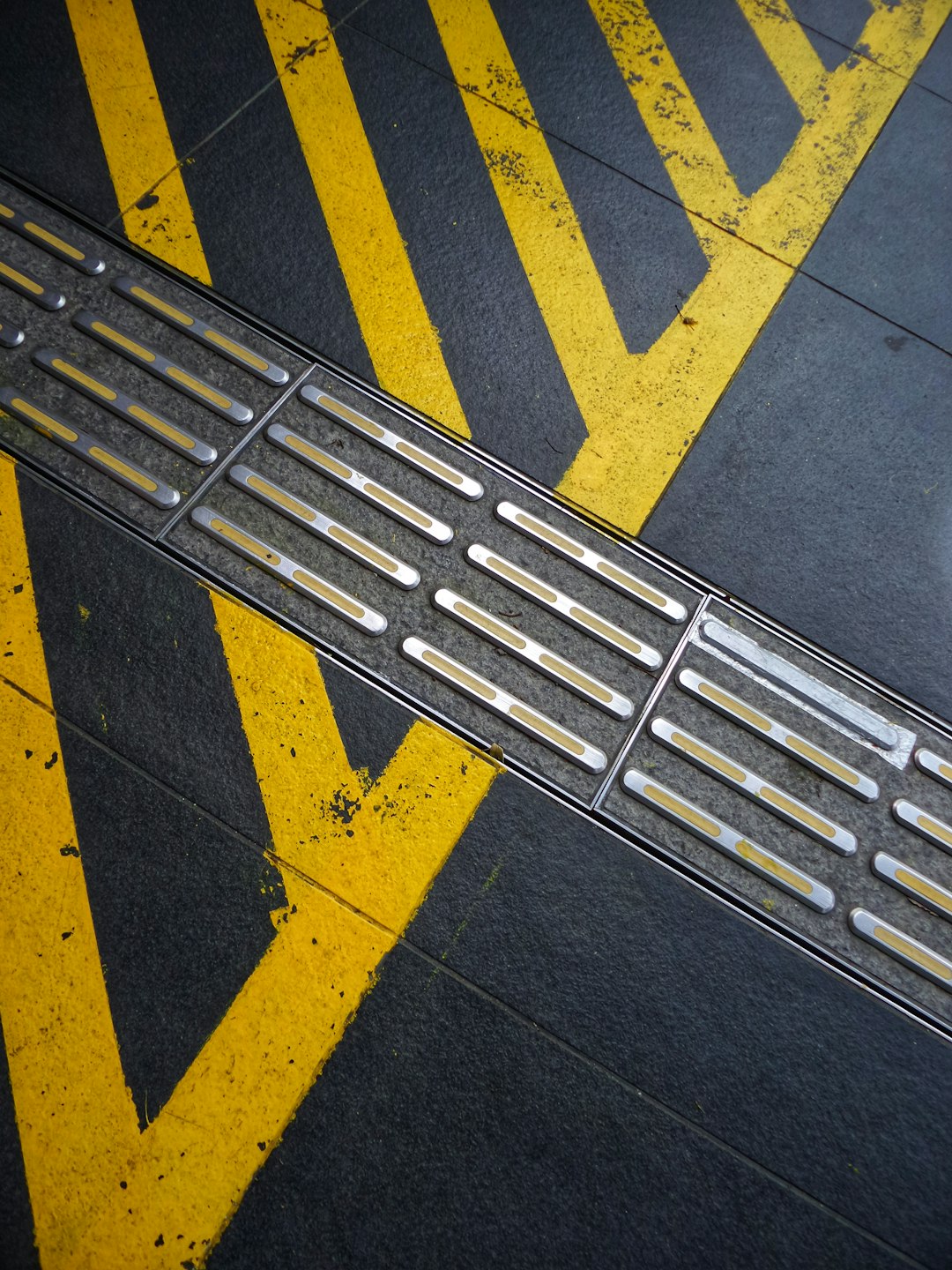 yellow and black pedestrian line