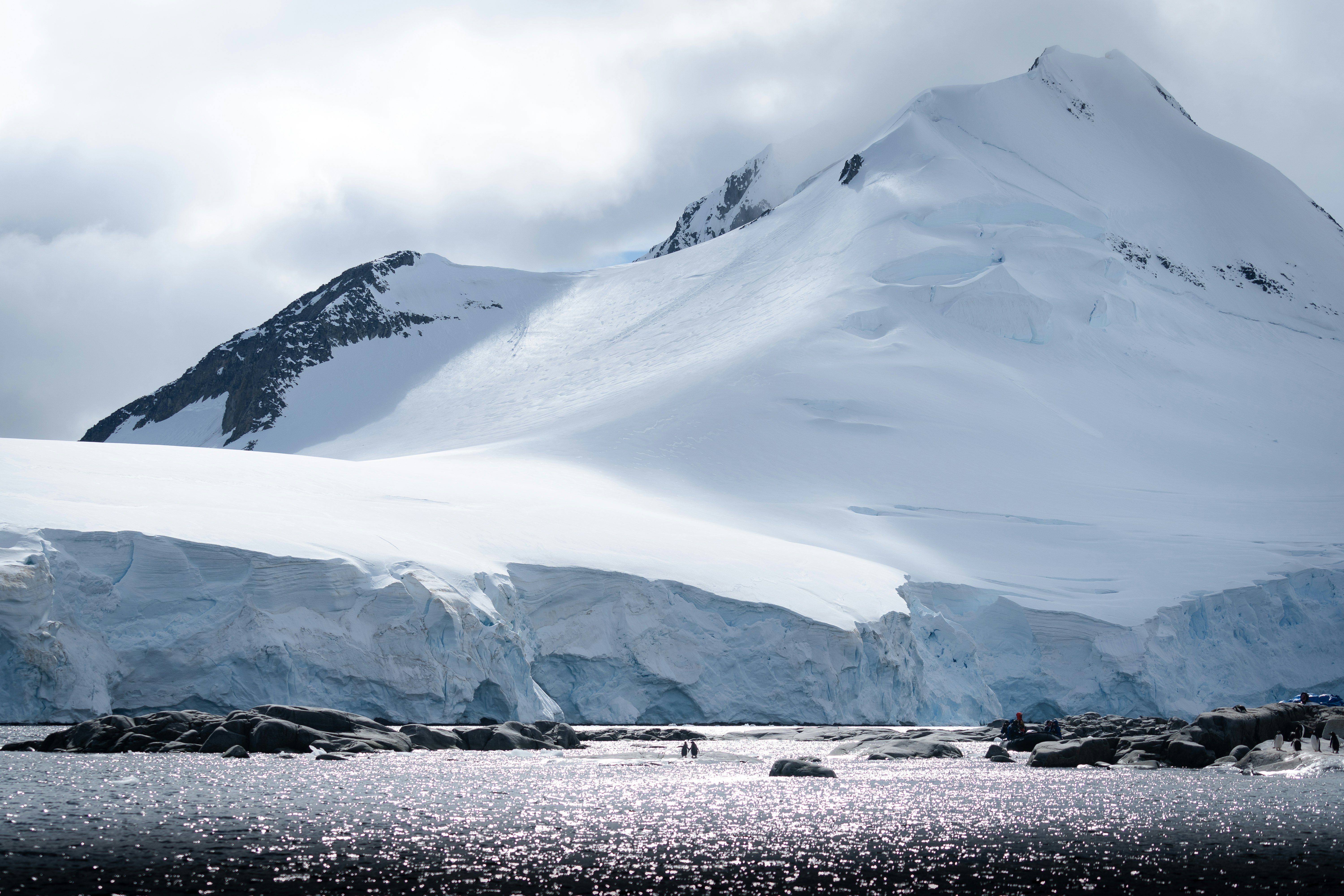 snow covered mountain during daytime