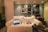A cozy living room showcasing portable tech devices and comfort.