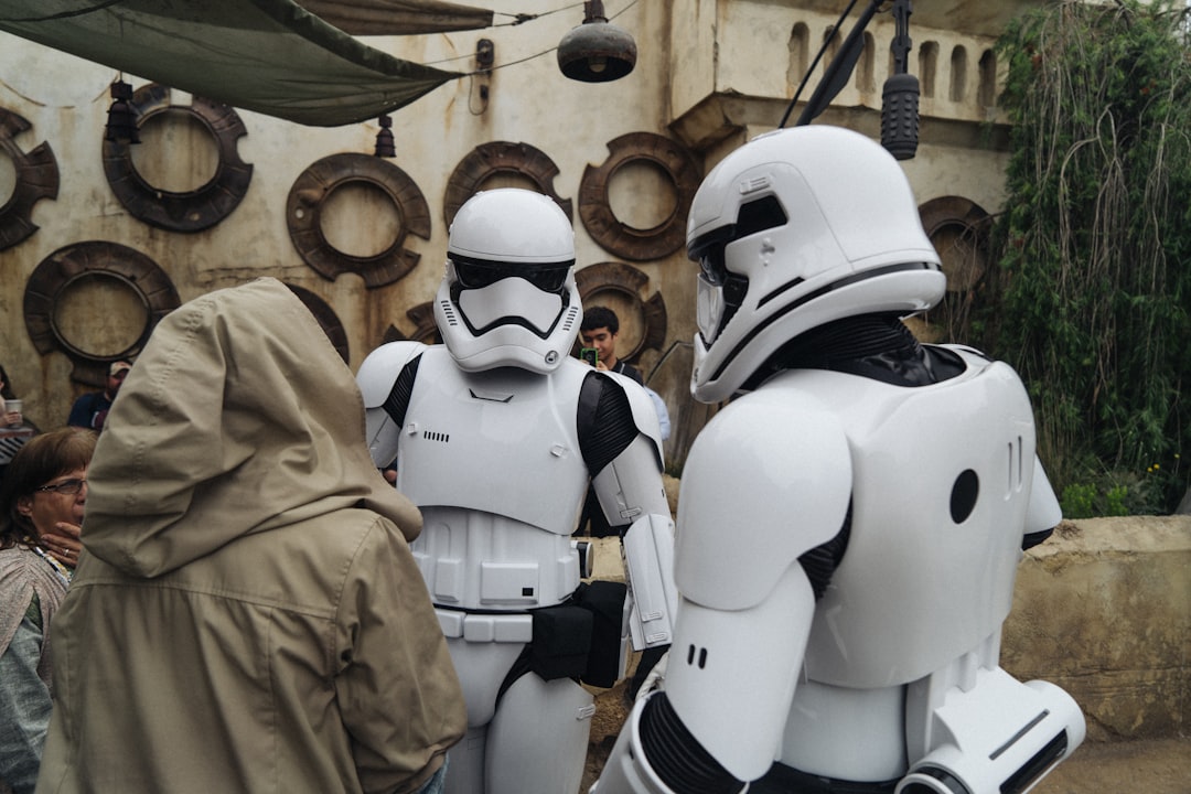 2 person wearing white and black mask