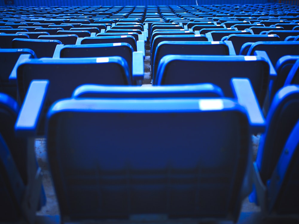 blue and black chairs in stadium