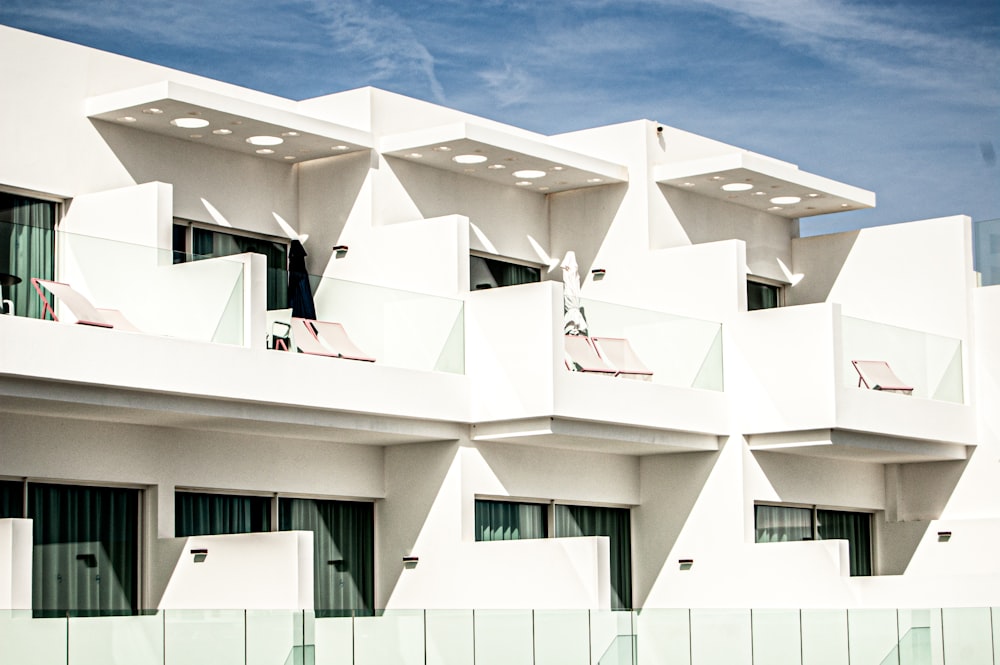 white concrete building under blue sky during daytime