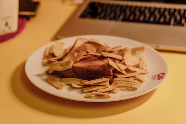Close-up of assorted sandwiches and snacks on a plate