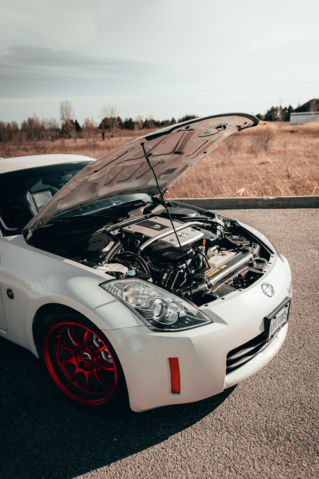 white porsche 911 parked on road during daytime