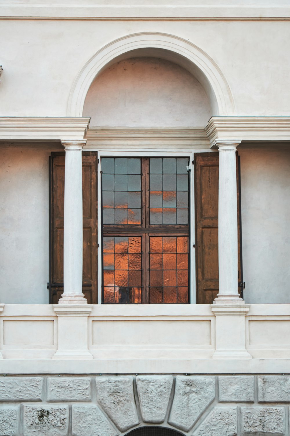 brown wooden framed glass window