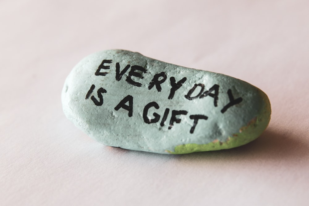 a rock with a message written on it