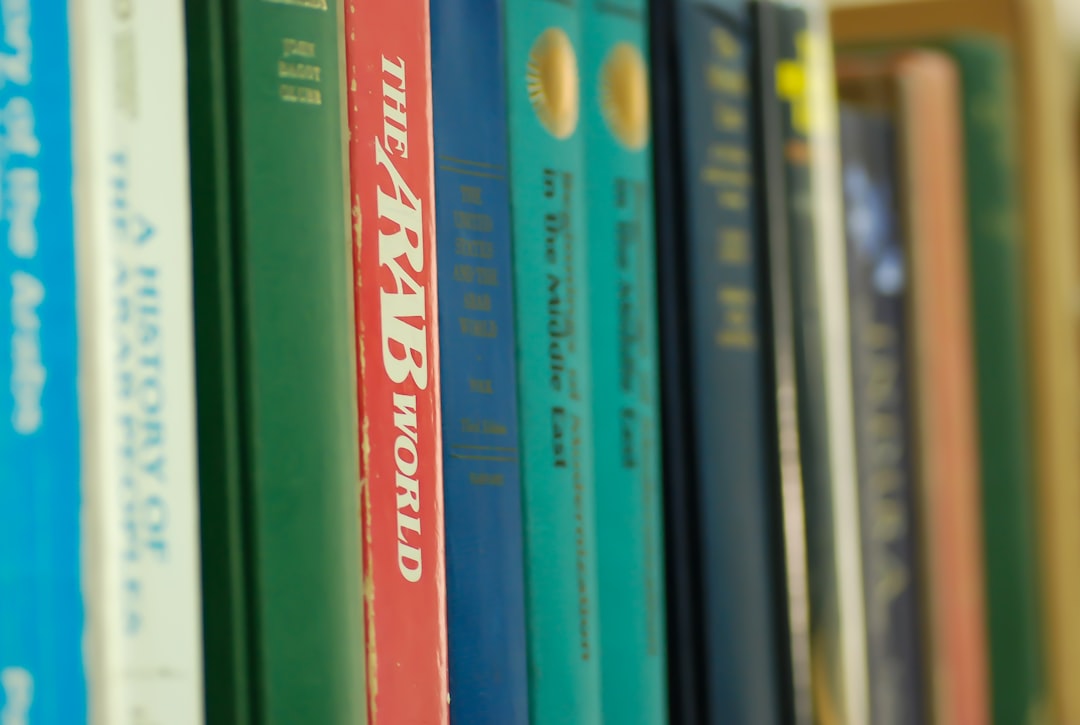 Books on a shelf in the library