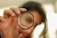 person holding black round frame