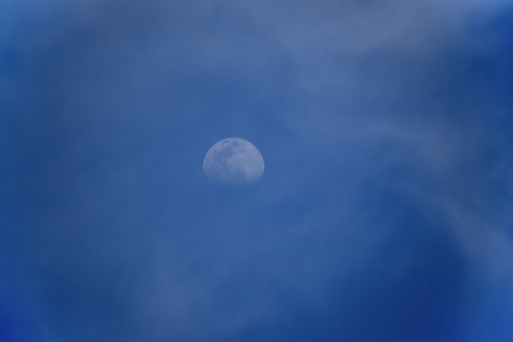 full moon in blue sky