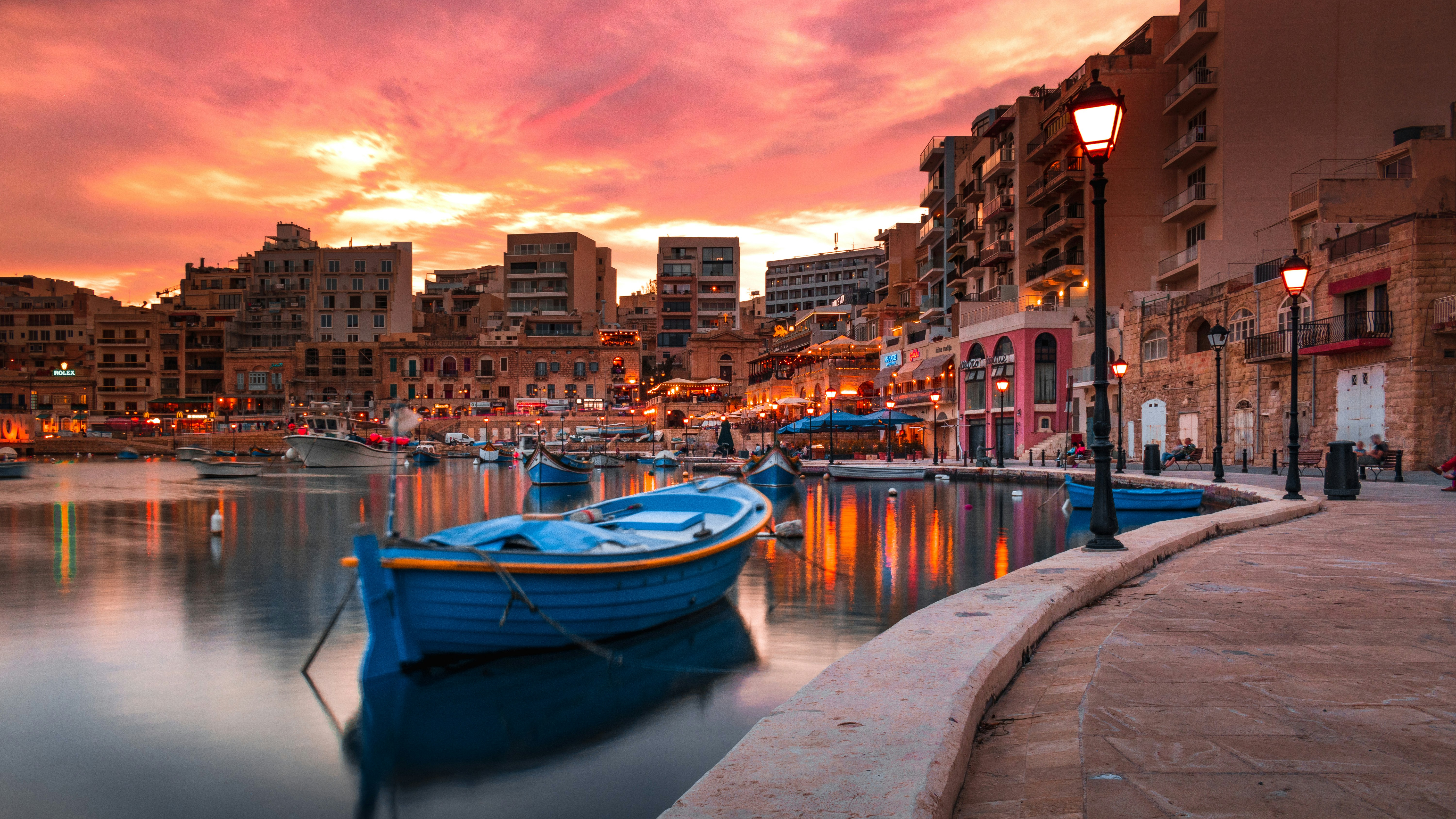 blue and white boat on dock during daytime malta teams background