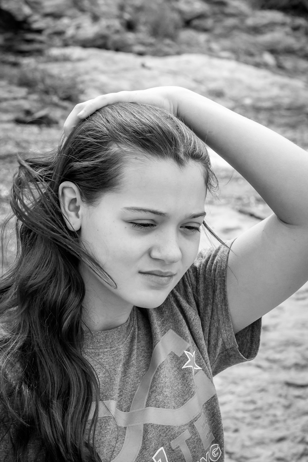 grayscale photo of girl in crew neck t-shirt