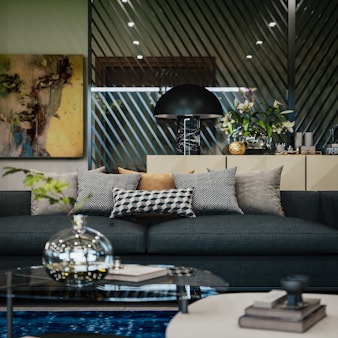 black and white throw pillows on black couch
