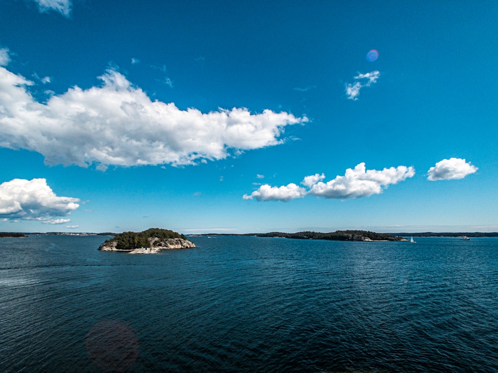 blue sea under blue sky during daytime