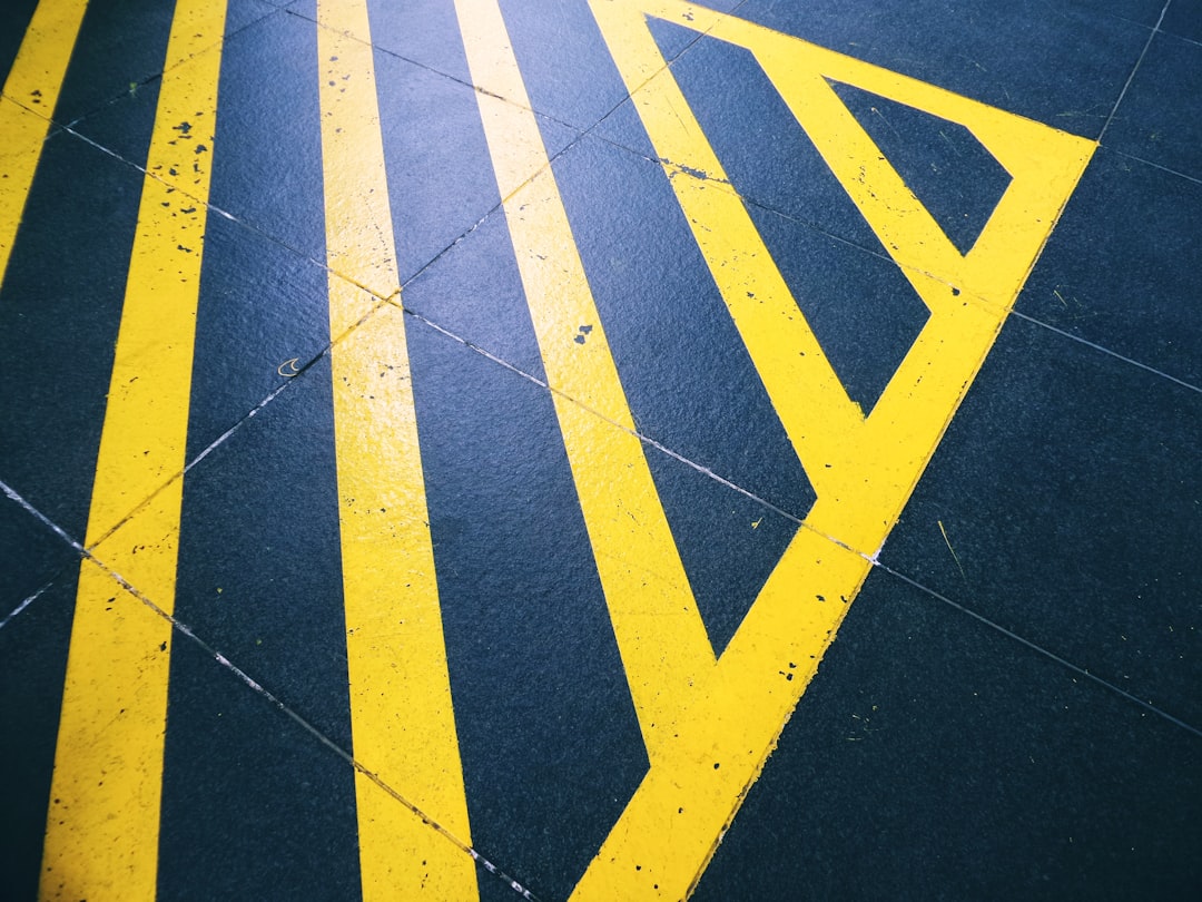 yellow and black pedestrian line